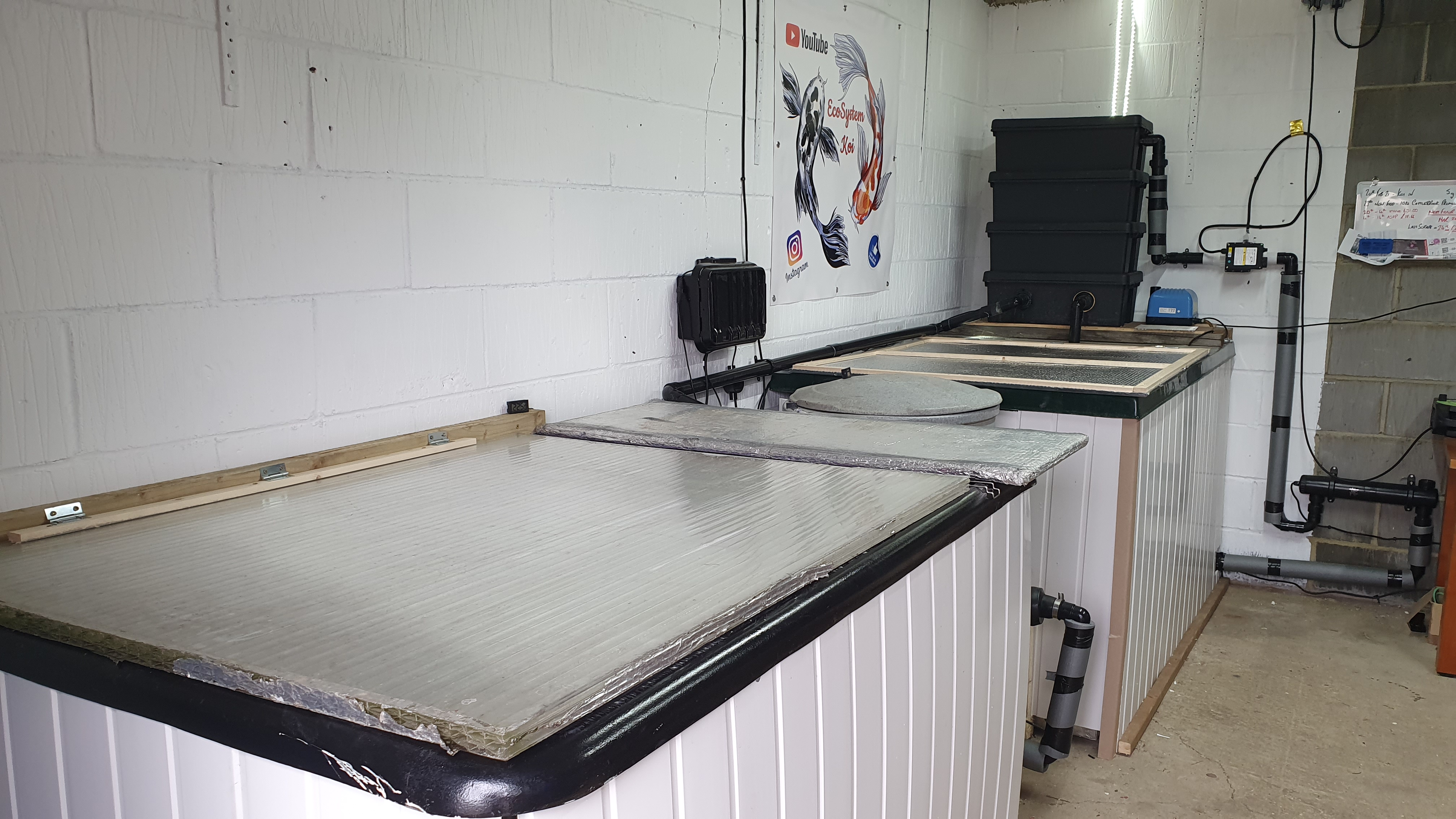 2 x Koi grow on tanks with bakki shower and ez pod filter