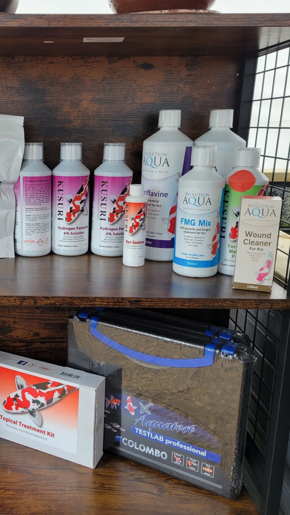 A Mix of koi treatments like FMG, acriflavin and koi sedate